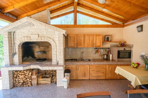 Kuchyň nebo kuchyňský kout v ubytování Iva Apartmani