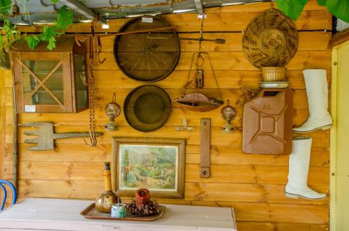 a wooden wall with various items on it at Ideal Studios in Amoudara Herakliou
