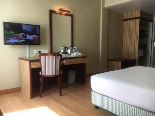 Katil atau katil-katil dalam bilik di Hotel Seri Malaysia Mersing