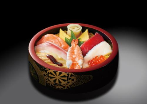 a bowl of sushi with fish and fruit in it at Hotel Cherena Kunitachi (Adult Only) in Kunitachi