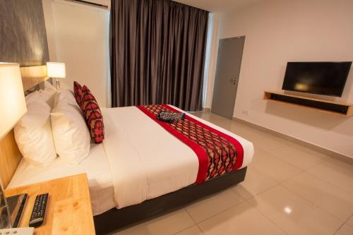 Hotel Adya Express Chenangにあるベッド