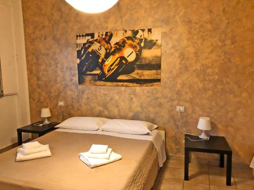 Postel nebo postele na pokoji v ubytování La Chiocciola Guesthouse Briantea