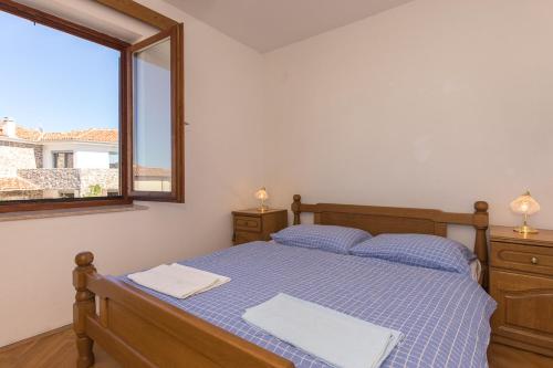 Postel nebo postele na pokoji v ubytování Rooms Miramare