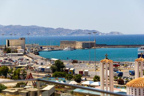 a view of a city with a body of water at Heraklion chic and minimalistic apartment with sea view in Heraklio