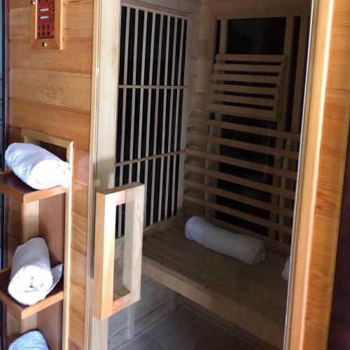 a small sauna with two pillows in a room at Apartments Ljiljanic in Budva