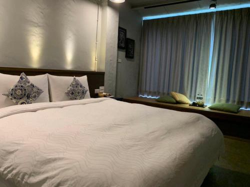 M Bar Houseにあるベッド