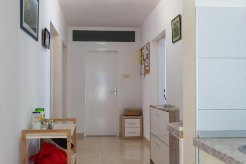 Kuchyň nebo kuchyňský kout v ubytování Apartment Ema