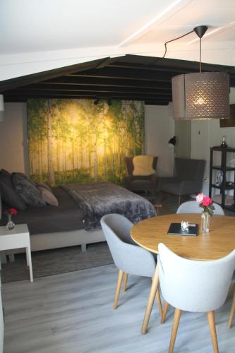 Ein Sitzbereich in der Unterkunft B&B de Rekkendonken