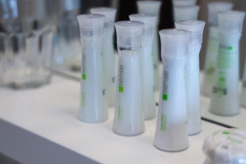 a row of white test tubes sitting on a shelf at B&B Artegnana 1798 in Grožnjan