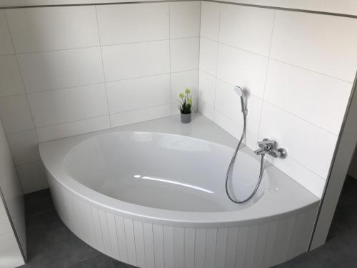 Et badeværelse på Ferienhaus Villa Wunderbar Dangast im Nordsee Park am Jadebusen