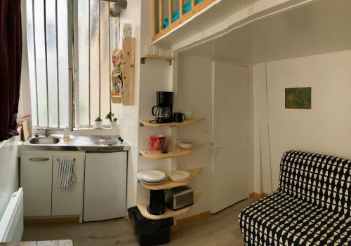 Foto de la galeria de Maisonnette studio sur cour a París