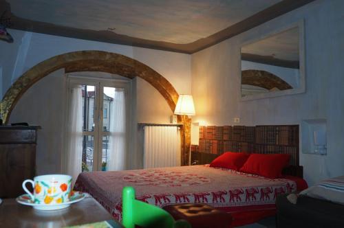 Ein Bett oder Betten in einem Zimmer der Unterkunft Monolocale Dormire alla Reggia