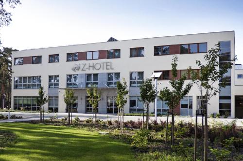 an office building with the word hotel on it at Z-Hotel Business & Spa in Otwock