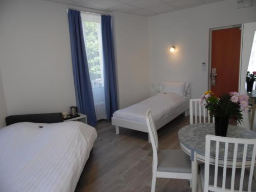 Ένα ή περισσότερα κρεβάτια σε δωμάτιο στο Chante Grelet