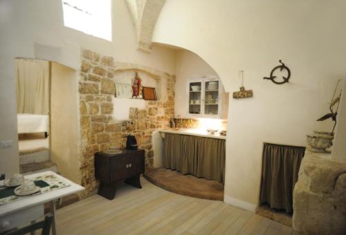 Kuchyň nebo kuchyňský kout v ubytování CARMÀ- Antica Tradizione