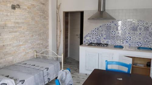 Kuchyň nebo kuchyňský kout v ubytování Villino Celeste fronte spiaggia