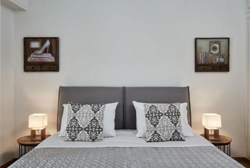 A bed or beds in a room at Chic One Bd Apartment with Hilton View