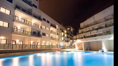 Alicante Hills Apartment Blue tesisinde veya buraya yakın yüzme havuzu