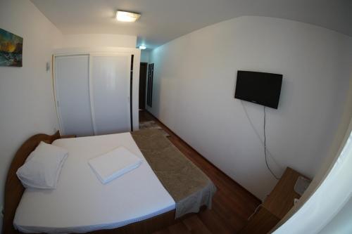 Voodi või voodid majutusasutuse Vila Trandafir toas
