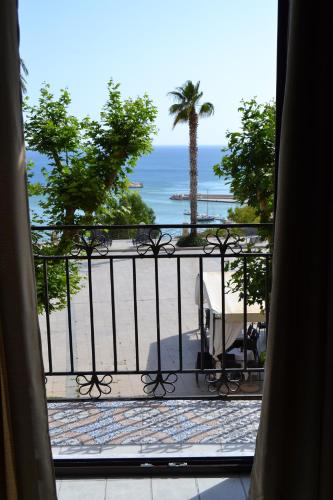 a view of the beach from a balcony at BnB Agorà Panoramic Rooms in Sciacca
