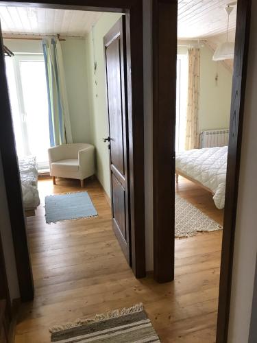Postel nebo postele na pokoji v ubytování Holiday home Usadba Novoselitsa
