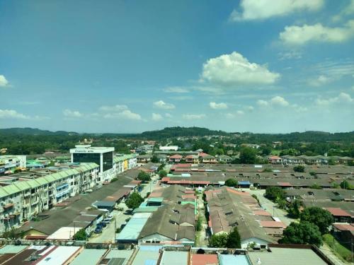 an aerial view of a city with buildings and cars at Purest Hotel Sungai Petani in Sungai Petani