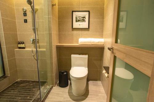 Ένα μπάνιο στο Atour Hotel Xi'an Gaoxin Jinye Road Branch