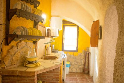 Η κουζίνα ή μικρή κουζίνα στο Cuevas de Rolando