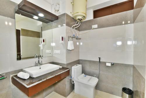 Ванная комната в Kapoor Resort by DLS Hotels