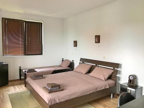 Ένα ή περισσότερα κρεβάτια σε δωμάτιο στο Villa Dimi