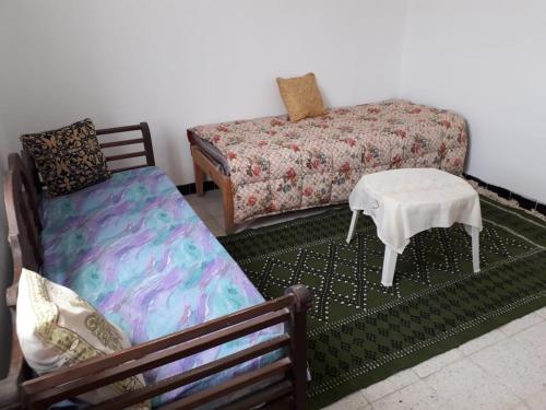 Un ou plusieurs lits dans un hébergement de l'établissement Bel appartement face à la méditerranée
