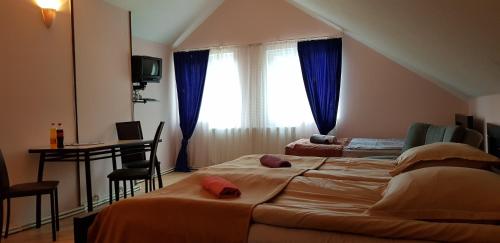 Postel nebo postele na pokoji v ubytování Guest house Likani 2017