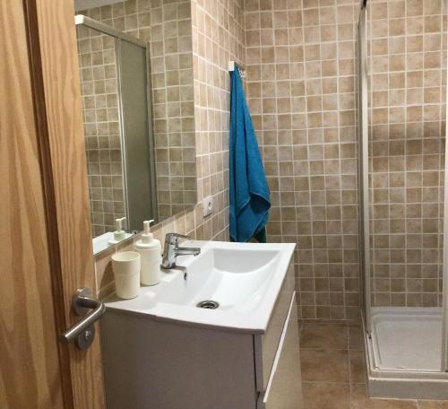 a bathroom with a sink and a shower at Charco Las Damas in Playa de San Juan