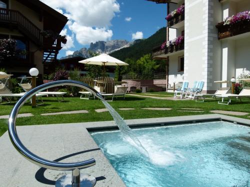 Photo de la galerie de l'établissement Hotel Gran Paradis, à Campitello di Fassa