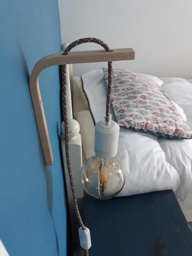 Postel nebo postele na pokoji v ubytování Appartement pour 6 sur la Grande Plage, St Gilles