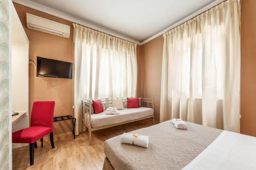 Uma cama ou camas num quarto em Lucca In Villa Elisa & Gentucca
