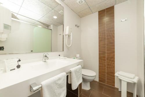 Koupelna v ubytování Hotel Prado II