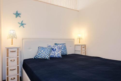 Postel nebo postele na pokoji v ubytování La Dimora al Mare