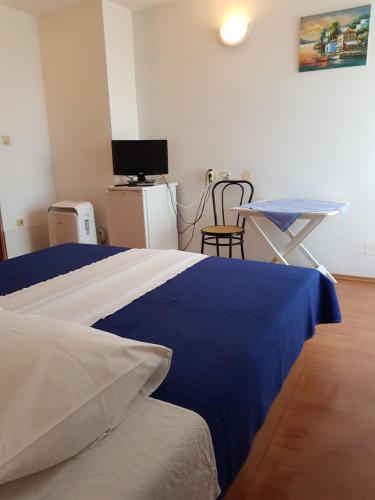 Postel nebo postele na pokoji v ubytování Guest House Vukušić