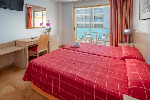 Posteľ alebo postele v izbe v ubytovaní 4R Salou Park Resort II