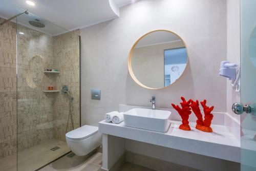 Ванная комната в Sarpidon Apartments