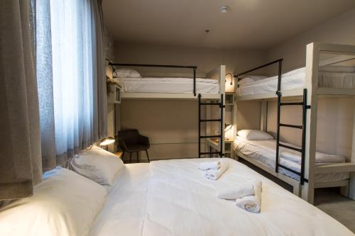 Cama o camas de una habitación en Boutique El-Rom