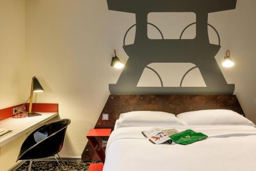 Кровать или кровати в номере Hotel am Schlosspark Herten