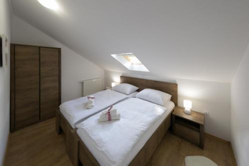 Ένα ή περισσότερα κρεβάτια σε δωμάτιο στο House Smolčić
