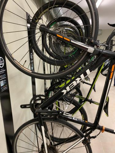 a bunch of bikes on a rack in a store at ARTIEM Audax - Adults Only in Cala Galdana