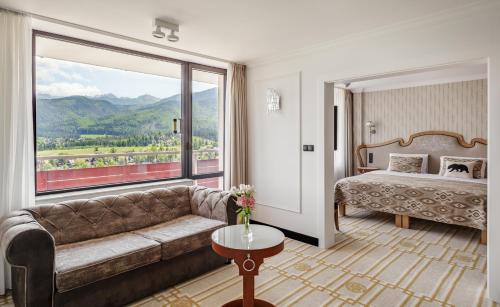 Postel nebo postele na pokoji v ubytování Bachleda Hotel Kasprowy