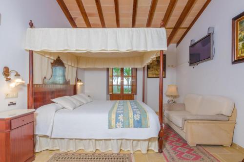 Llit o llits en una habitació de Ca na Ramona
