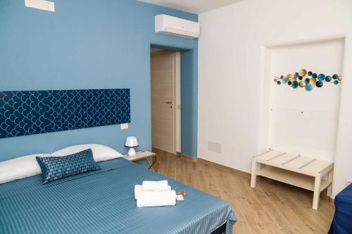 Ένα ή περισσότερα κρεβάτια σε δωμάτιο στο ‘A Minnula