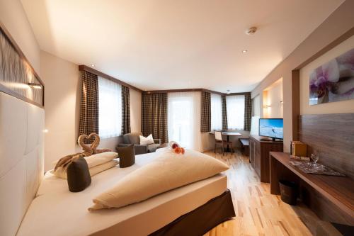 Hotel Jennys Schlösslにあるテレビまたはエンターテインメントセンター