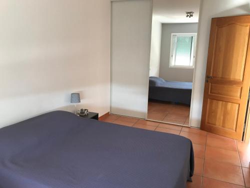 Postel nebo postele na pokoji v ubytování Appartement à la mer